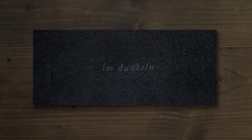 black flip book on wood structure